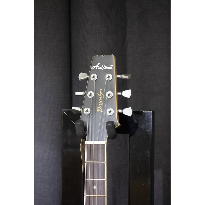 Aria® 718-MK2 Guitarra Eléctrica Brooklyn Les Paul® Style Color: Open Pore White